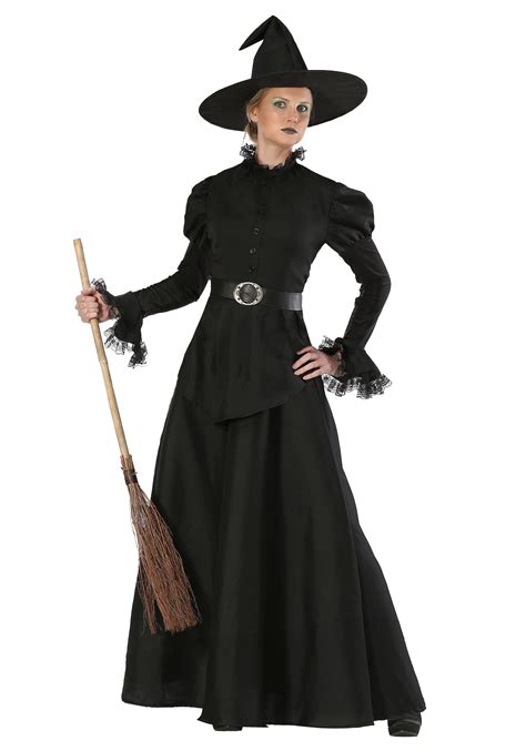 Halloween witch in black cloak